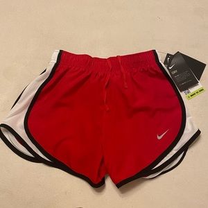 red Nike shorts